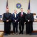 In the picture, from left to right, are Judge Paul E. Cherry, District Attorney Ryan P. Sayers, First Assistant District Attorney F. Cortez “Chip” Bell III, and Judge Fredric J. Ammerman.