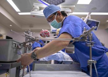 Dr. Johnny Hong works in an operating room during a training session for the surgical transplant team at Penn State Health Milton S. Hershey Medical Center.