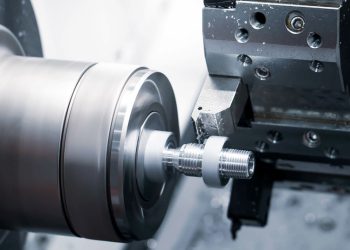 A CNC lathe machine completing a cutting process.

Credit: Adobe Stock