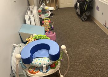 Toys and child seats line the hallway of a preschool and child care center.

Courtesy of Holli Zelinsky