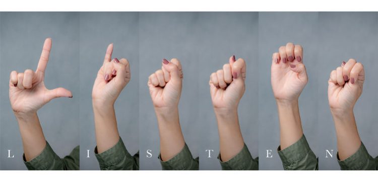 Hands gesturing using American Sign Language to spell the word “listen.”

Credit: Adobe Stock