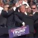 Former President Donald Trump, surrounded by U.S. Secret Service agents, pumps his first after pops were heard at his rally in Butler, Pa. on July 13, 2024. 

Donald J. Trump | Facebook