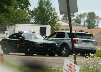 Police vehicles near the site of the Butler, Pa., venue where President Donald Trump was speaking when he was struck in the ear by a bullet in an assassination attempt

Grace David | For The Center Square