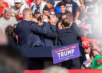 The Secret Service immediately surround former President Trump after he was shot during his campaign stop at the Butler Farm Show grounds on Saturday, July 13, 2024.

Ralph LoVuolo / Special to the Butler Eagle