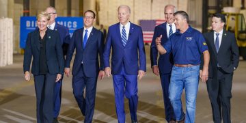 Gov. Josh Shapiro with President Joe Biden (center) at Tioga Marine Terminal in Philadelphia, Pennsylvania.  White House photo by Cameron Smith