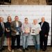 Pictured, from left to right, are: Shane Oschman (chair of the PA Wilds Board of Directors), Sen. Bob Casey's aide Liz Cooper, Congressman Glenn Thompson's aide Brad Moore, award recipient Kenn Starr, award recipient Ken Starr, and state Rep. Mike Armanini.