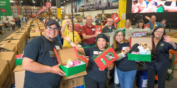 Regional processing centers bustle with activity as volunteers ready shoebox gifts for their trip overseas. (Photo is courtesy of Samaritan's Purse)