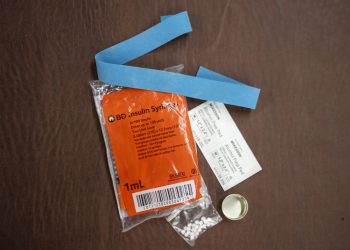 Syringes, alcohol swabs, and other supplies sit on a table in Western Pennsylvania.

Nate Smallwood / For Spotlight PA