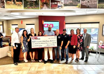 Wounded Warrior Project: From left are: Michael Peduzzi (CEO, CNB), Eileen Ryan (CNB), Kylie Graham (CNB), Sherry Wallace (CNB), Eric Collins (CNB), Travis McCullough (Dented Keg), Derek McCullough (Dented Keg), Carrie Wood (CNB), Jessica Zupich (CNB) and Greg Dixon (CNB).