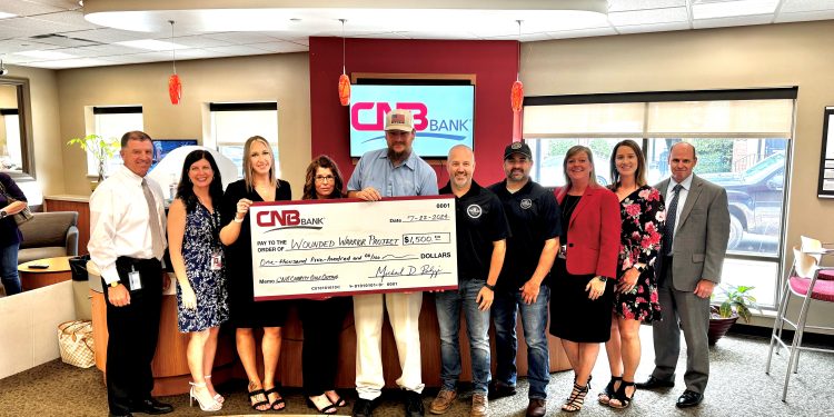 Wounded Warrior Project: From left are: Michael Peduzzi (CEO, CNB), Eileen Ryan (CNB), Kylie Graham (CNB), Sherry Wallace (CNB), Eric Collins (CNB), Travis McCullough (Dented Keg), Derek McCullough (Dented Keg), Carrie Wood (CNB), Jessica Zupich (CNB) and Greg Dixon (CNB).