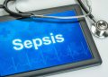 Tablet with the diagnosis Sepsis on the display