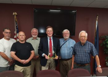 Current Clearfield Borough President Steve Livergood, Clearfield Regional Police Chief Vincent McGinnis, and former borough council members, Larry Mack, Harvey Haag and Jim Leitzinger gathered on Friday to honor F. Cortez “Chip” Bell III, (center) who is retiring after 34 years as the borough’s solicitor. (Julie Rae Rickard).