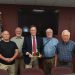 Current Clearfield Borough President Steve Livergood, Clearfield Regional Police Chief Vincent McGinnis, and former borough council members, Larry Mack, Harvey Haag and Jim Leitzinger gathered on Friday to honor F. Cortez “Chip” Bell III, (center) who is retiring after 34 years as the borough’s solicitor. (Julie Rae Rickard).