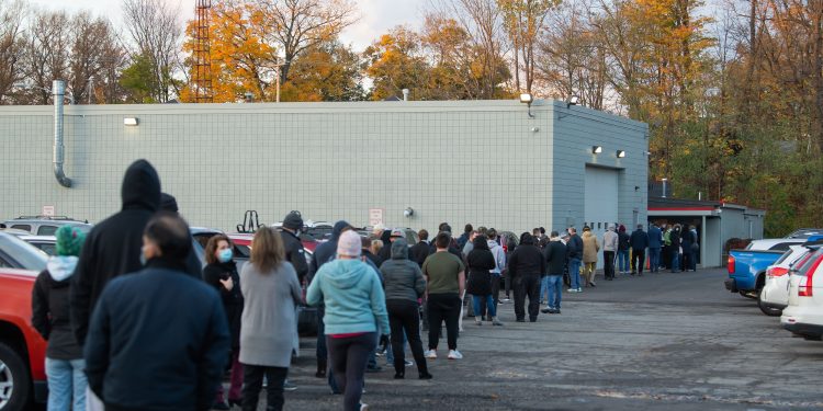 Voters stand in line at Belle Valley Fire Department in Erie County waiting to vote in person on Nov. 3, 2020.

Robert Frank / For Spotlight PA