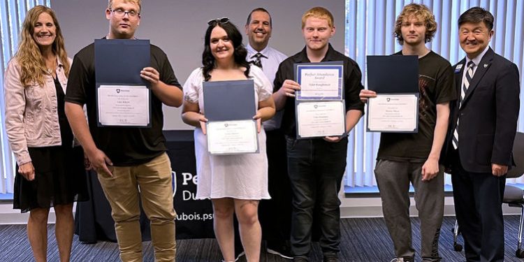 Students and staff members gather for a group photo during the graduation ceremony for the post high school CNC program at Penn State DuBois. From left to right, Pam Streich, executive director of Workforce Solutions of North Central Pennsylvania; Luke Eckert; Skylar Bowers; John Brennan, director of continuing and community education at Penn State DuBois; Tyler Baughman; Hunter Tharp; and Jungwoo Ryoo, chancellor and chief academic officer at Penn State DuBois.

Credit: Penn State