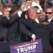 Former President Donald Trump, surrounded by U.S. Secret Service agents, pumps his first after pops were heard at his rally in Butler, Pa., on July 13, 2024. 

Donald J. Trump | Facebook