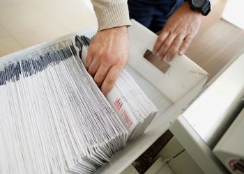 Mail-in ballots are sorted and counted by workers on Election Day in Northampton County. Pennsylvania lawmakers instituted no-excuse mail voting for the first time in 2019.

Matt Smith / For Spotlight PA