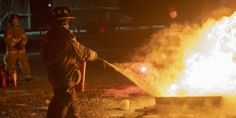 A firefighter puts out a fire during a training class.

Abby Drey / Centre Daily Times