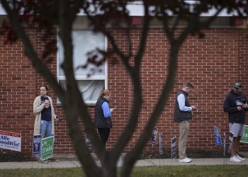 Voters stand in line while waiting for a polling place to open, Tuesday, Nov. 5, 2024, in Springfield, Pa.

Matt Slocum / AP