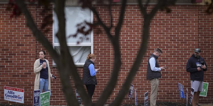 Voters stand in line while waiting for a polling place to open, Tuesday, Nov. 5, 2024, in Springfield, Pa.

Matt Slocum / AP