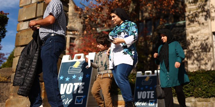 Voters walk past “Vote Here” signs at Temple Sinai in the Squirrel Hill neighborhood of Pittsburgh, PA, on Election Day on Nov. 5, 2024.

Jared Wickerham / For Spotlight PA