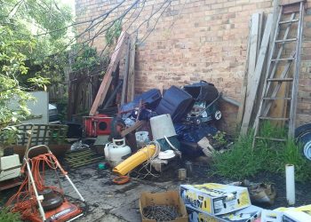 A cluttered backyard.

Wikimedia Commons