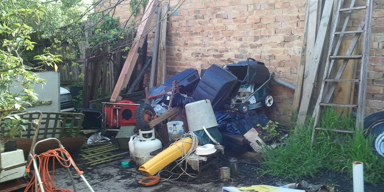 A cluttered backyard.

Wikimedia Commons