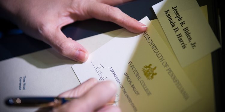 Electors filling out their ballots on Dec. 14, 2020.

Commonwealth Media Services